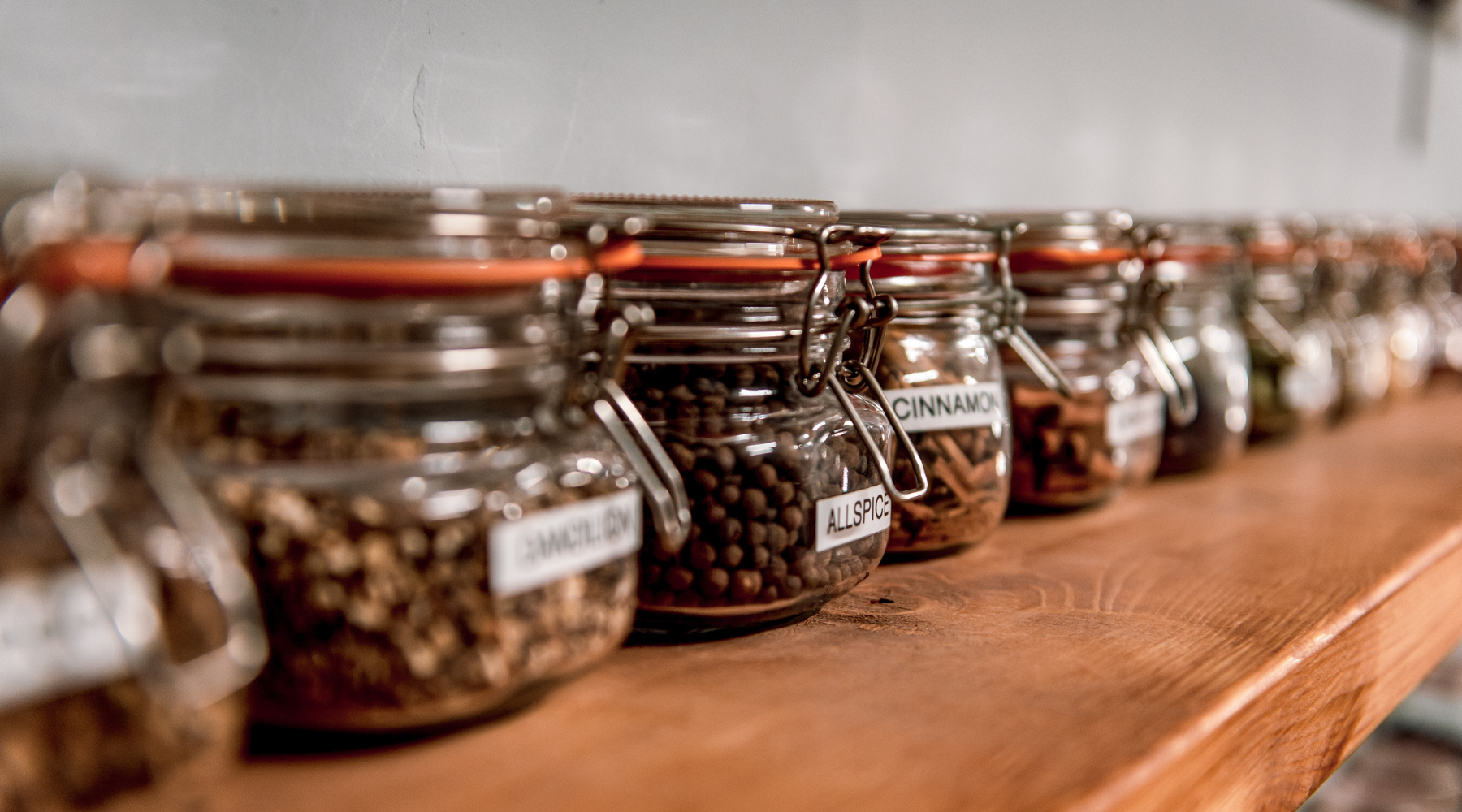 Botanicals lined up in jars at Nelson's Gin, Rum & Vodka School.