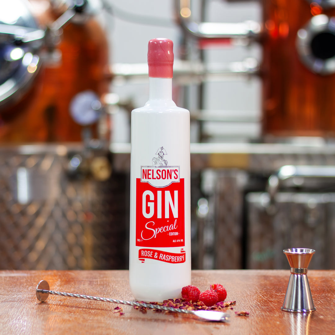 Nelson's Rose & Raspberry Gin in front of blurred out still, Victory.