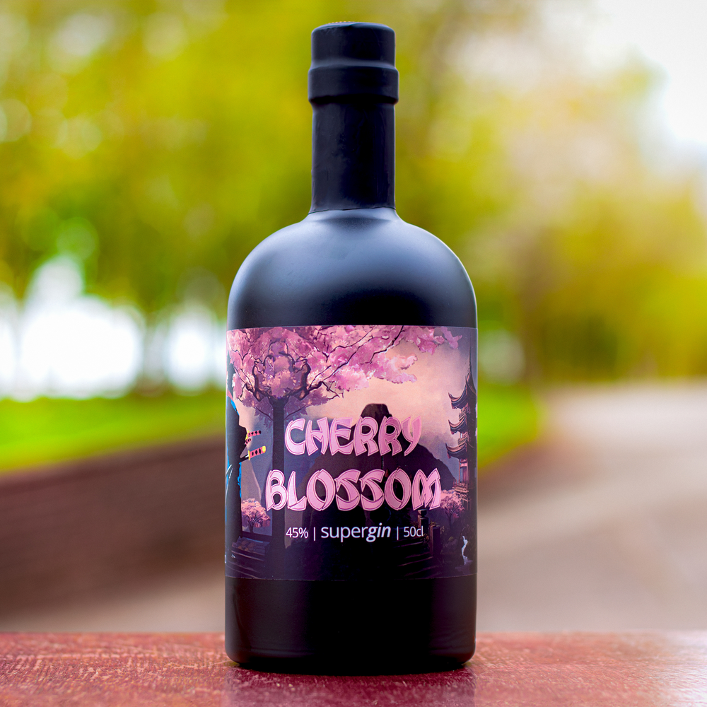Roy Wood's Cherry Blossom Gin set outside with blurred landscape background.