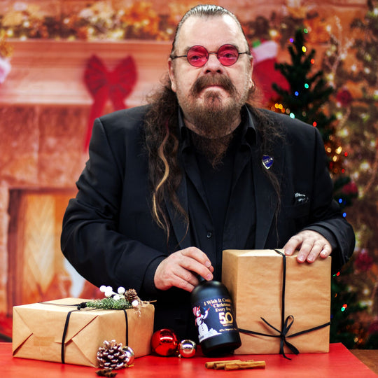 Roy Wood with his I Wish It could Be Christmas Every Day Gin.
