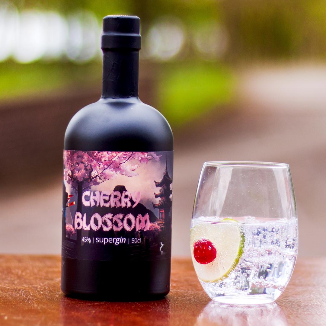 Roy Wood's Cherry Blossom Supergin with perfect serve. Set outside with blurred landscape.
