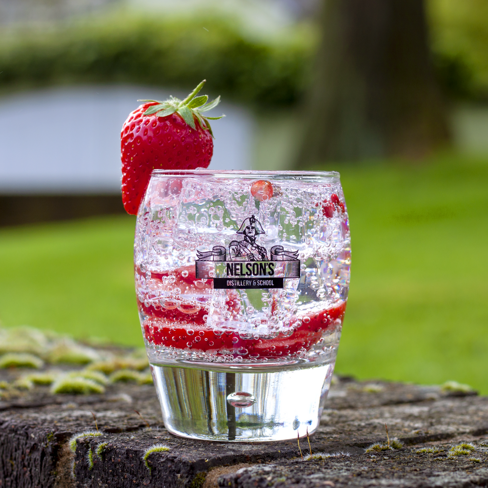 Nelson's Strawberry & Pink Peppercorn Gin & tonic with strawberry garnish. 